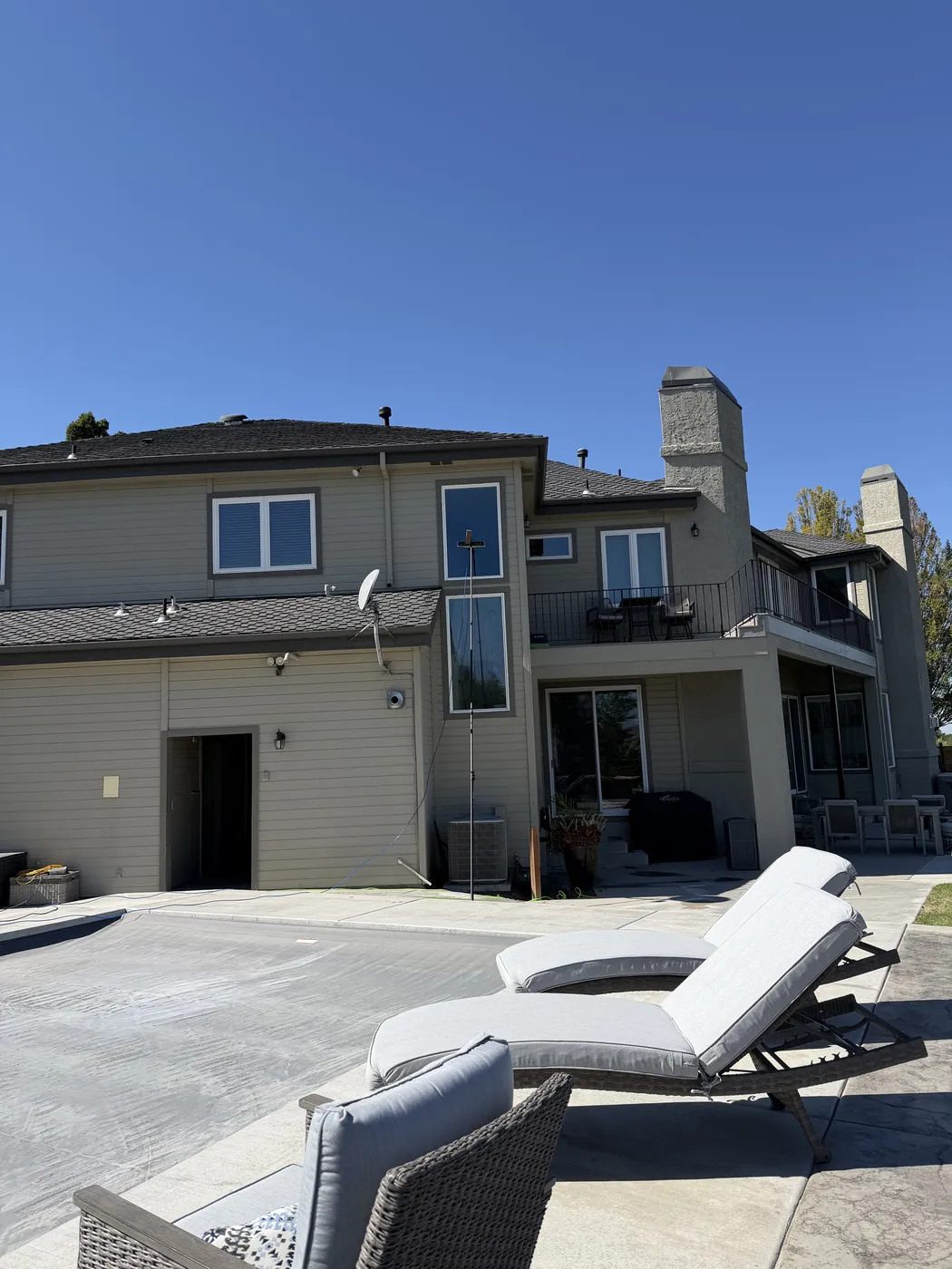 Two-story Treasure Valley home with clean siding and a tidy, well-kept exterior